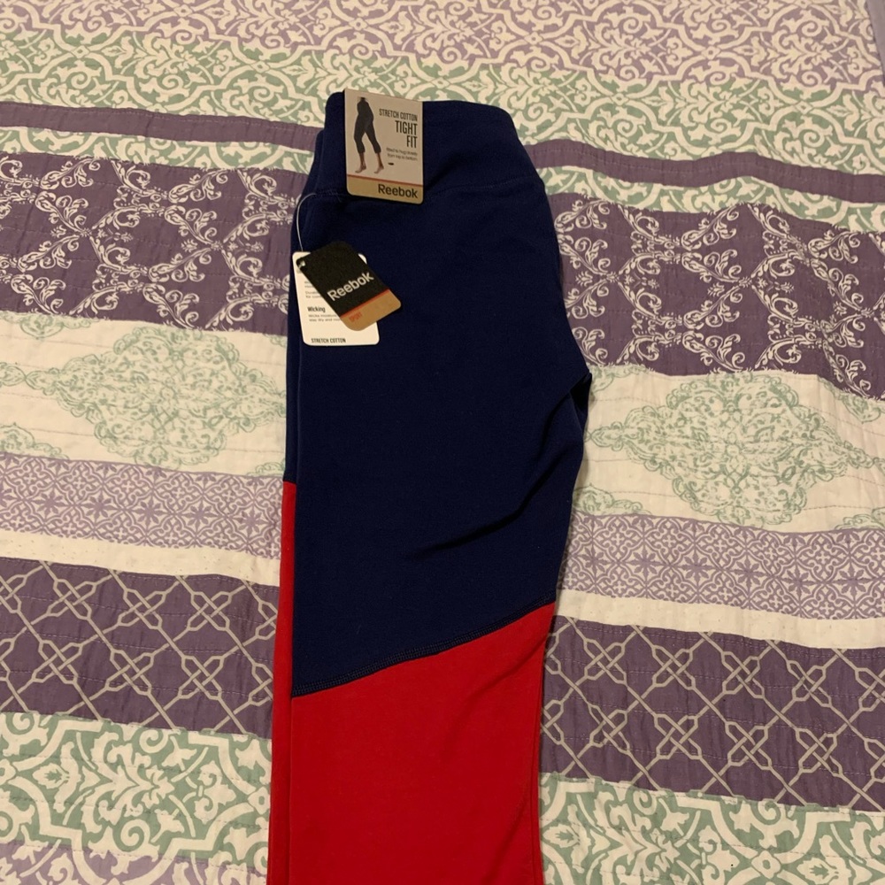 NWT Reebok Women’s workout Capri leggings, blue, red and white